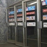 Рекламные стикеры на дверях